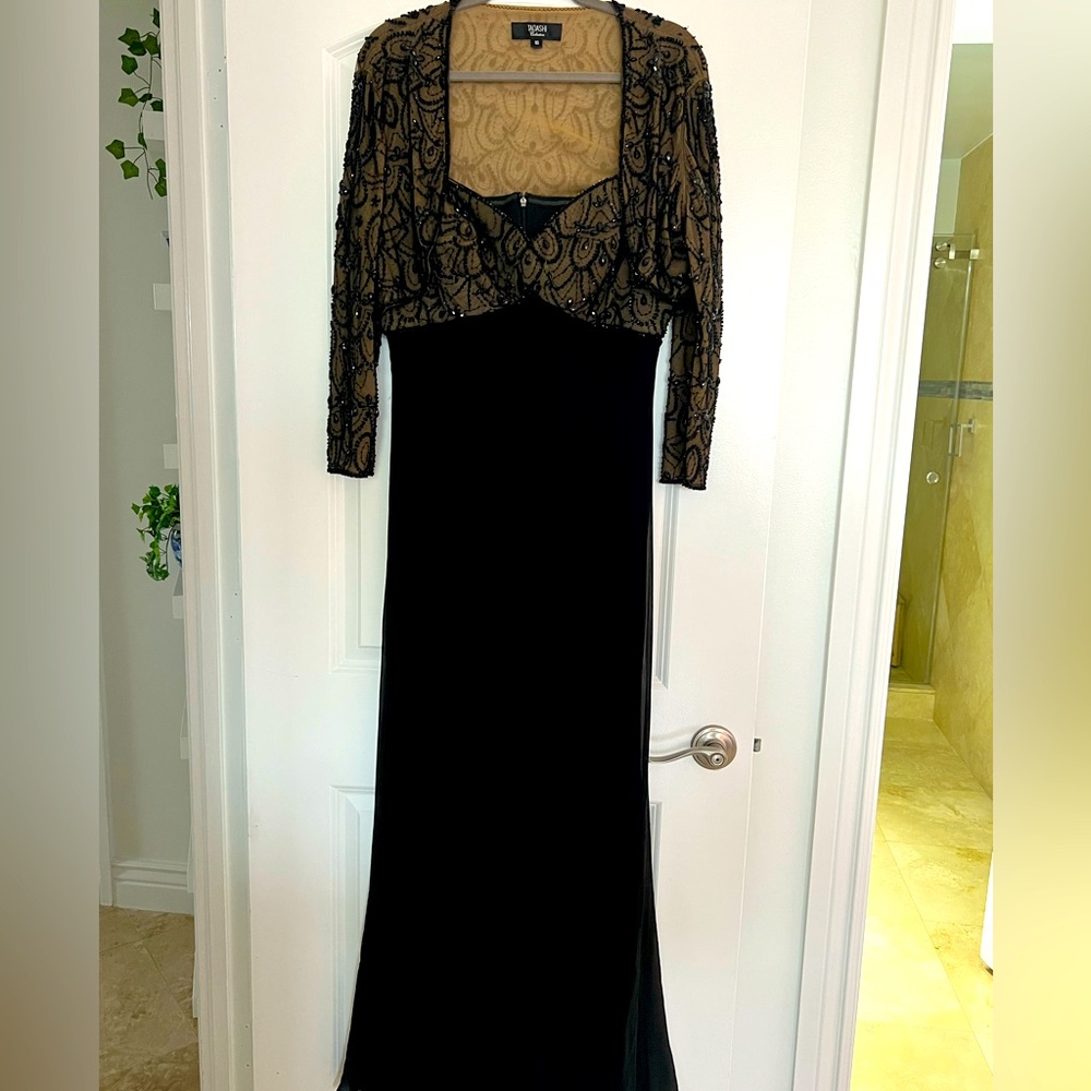 Beautifulful black strapless gown with a jacket and black stones